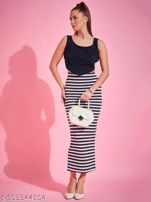 Ankle length black and white pencil skirt with a visible side slit