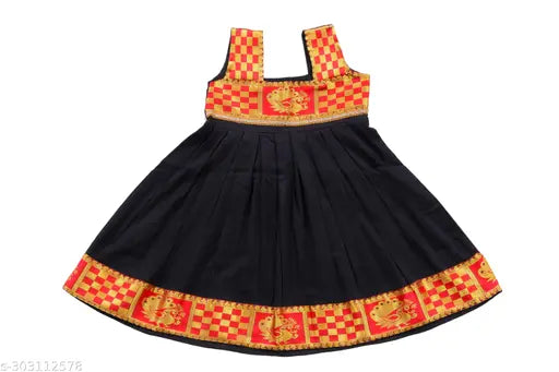 Festive baby girl's outfit, vibrant yellow zari borders on pink silk cotton frock with checkered pattern