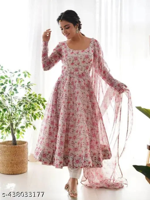 Light pink and white georgette Miral Gown with long sleeves, featuring delicate rose patterns and crepe lining for comfort. Ideal for casual or semi-formal events. Made in India