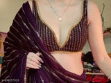 Purple sequined sari with intricate design, embellished border