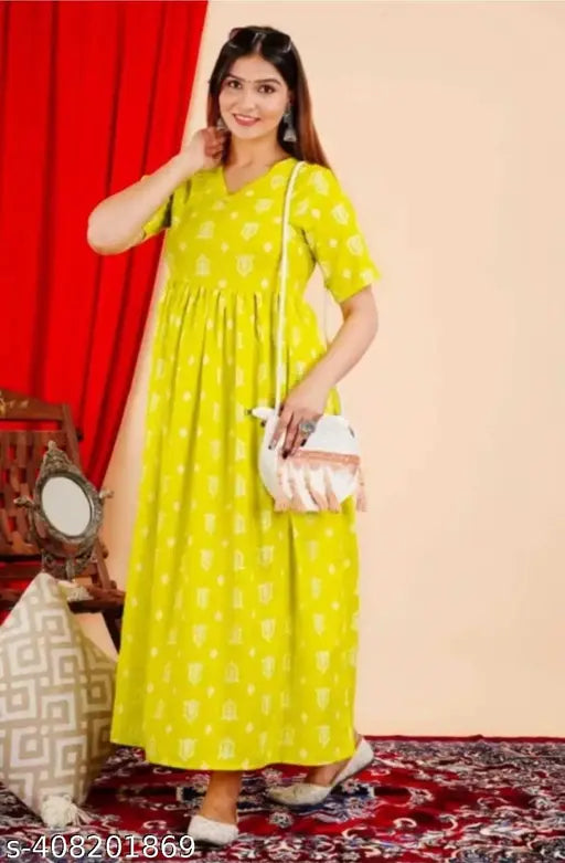 Yellow printed viscose rayon kurta gowan set with dupatta and pants, embroidered yoke, V-neck, quarter sleeves, and gota detailing