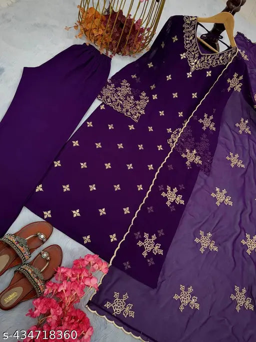 Violet Georgette sari with heavy embroidered work, sequin detailing, and complementary blouse
