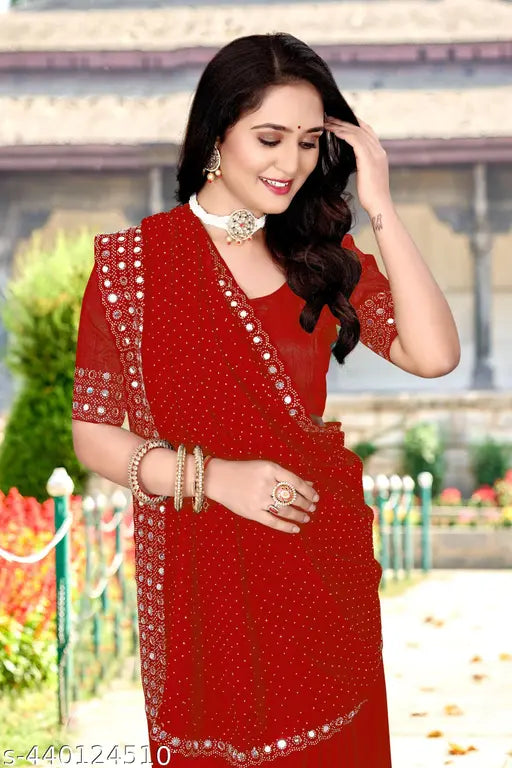 Red georgette saree with intricate designs and borders, featuring a pallu and matching blouse