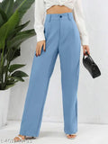 A person wearing blue high waisted trousers