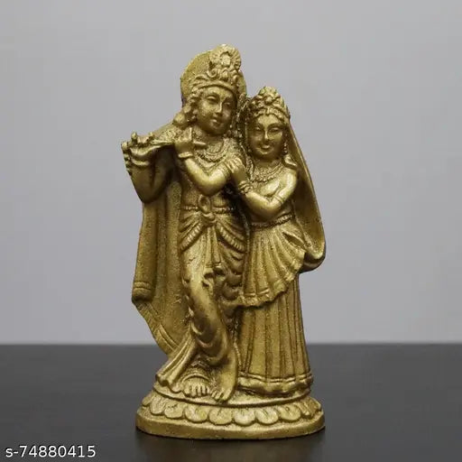 Gold-toned resin Radha Krishna antique figurine, 1.5" x 10". Detailed depiction of Lord Krishna playing flute and Radha leaning on his shoulder, popular Indian devotional statue