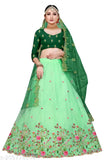 Heavy net embroidered lehenga choli with dupion silk blouse and net dupatta, intricate thread work and cutwork border, Indian bridal wear on mannequin