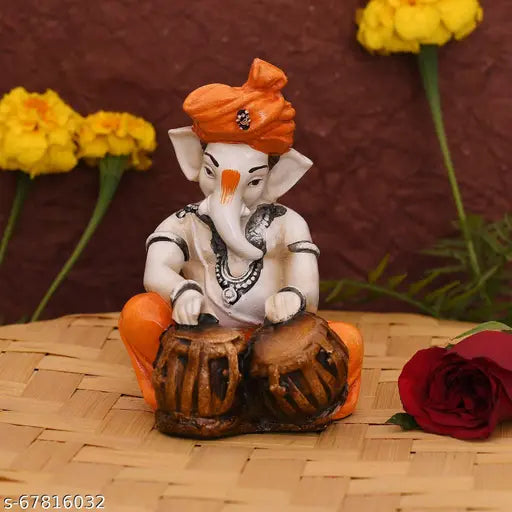Resin Ganesha statue playing tabla, 9cm x 14cm x 7cm, Hindu musical showpiece for home decor