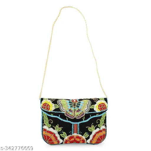 Designer leather clutch, patterned with blue floral embellishment