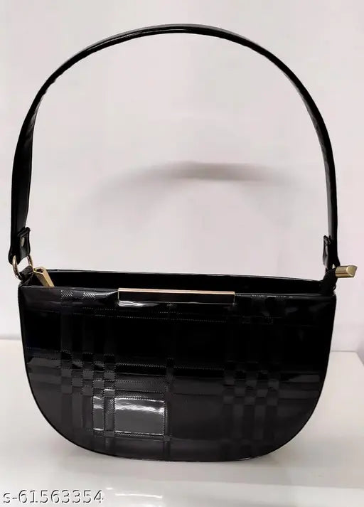 Black slingbag with a rectangular pattern, short shoulder handle, and a lightweight design