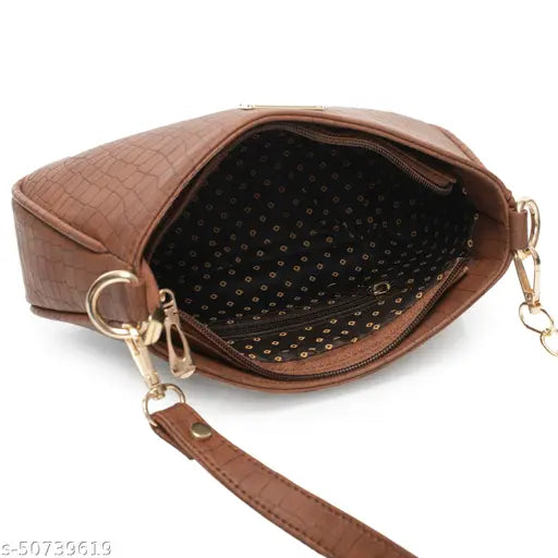 Brown leather clutch purse with gold polka dots
