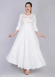 White Rayon Slub Embroidered Kurti, three-quarter sleeves, Indian fashion clothing on model