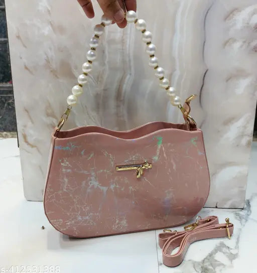 Stylish marble-like material sling bag with pearl detailing and multiple pockets for women's fashion accessories