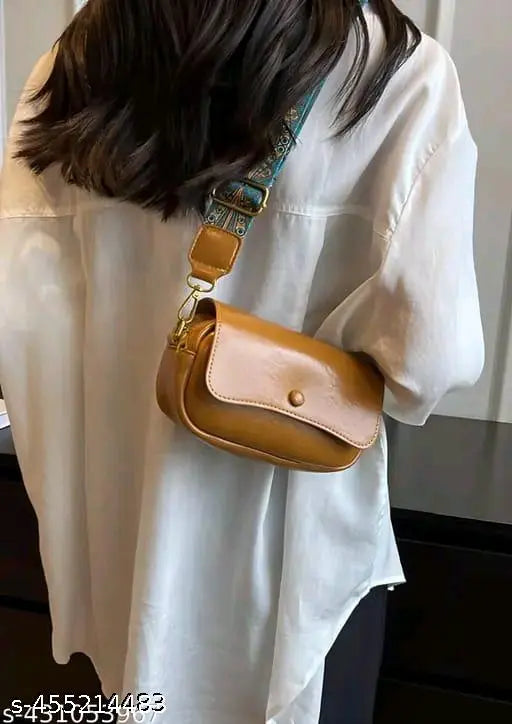 Trendy brown leather hobo sling bag with zip closure