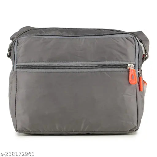 Grey canvas GUKA women's sling bag with four zip compartments