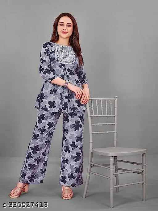 Crepe tunic top with palazzo pants, elastic waistband & 2 pockets. Indian women's fashion wear