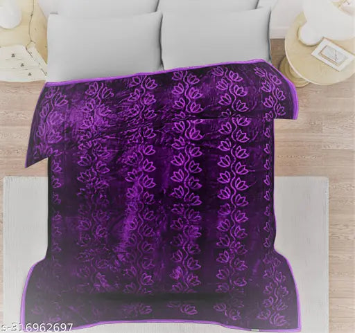 Purple velvet bedspread with intricate pattern