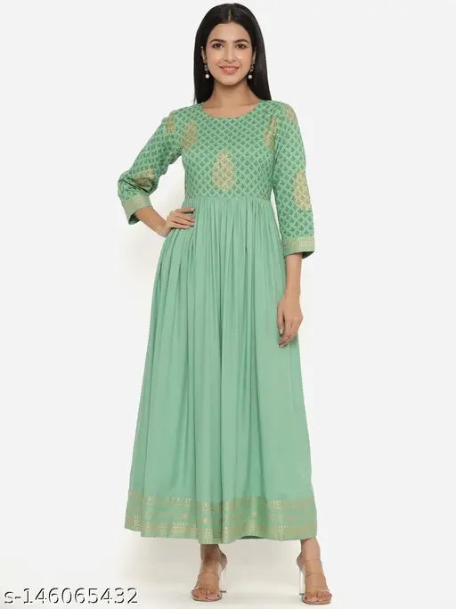 Green rayon printed Anarkali Kurta with embroidered gold design, ideal for parties or casual occasions. Authentic Indian product by INDIANIC