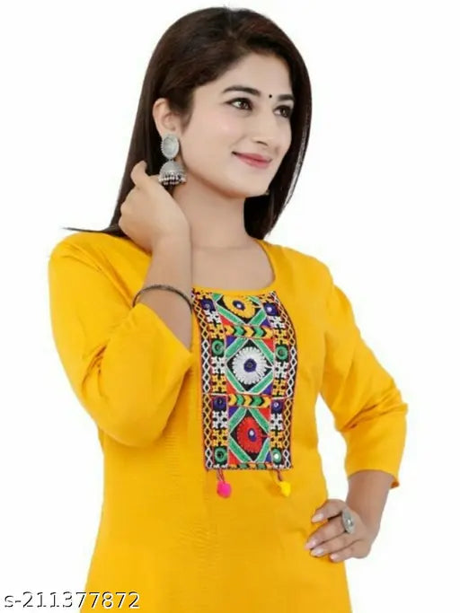 Yellow rayon kameez and skirt set with intricate embroidery