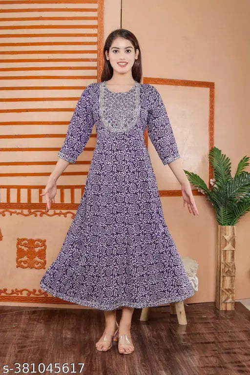 Purple rayon Anarkali kurti, three-quarter sleeves, printed combo. Indian women's fashion wear on mannequin