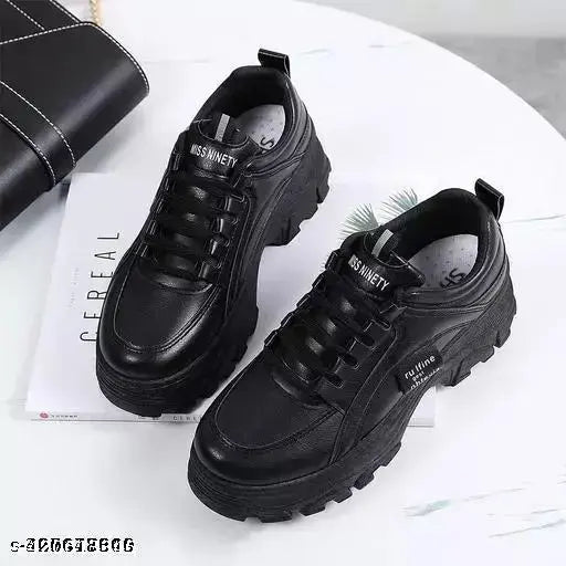 Black synthetic sneaker by Faiter, lace-up design with net detail, available in sizes 3-8 (US)