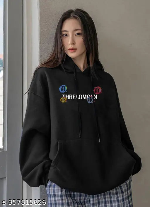 Black oversize cotton hoodie, long sleeves with printed design. Size S: bust 40in, length 27in