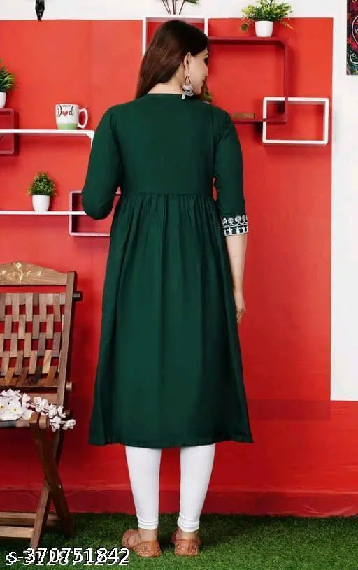 Green embroidered kameez with a round neckline