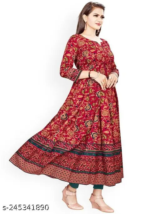 Rayon printed Anarkali long gown, vibrant combo, three-quarter sleeves. Women's fashion wear on mannequin