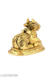 Brass Nandi bull statue, traditional South Indian decorative item for home or office, depicting Lord Shiva's gate-keeper and Parvati's vehicle. Handcrafted from brass with intricate details, height 2.5cm, breadth 3cm. Made in India