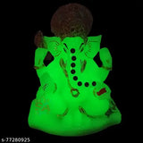 Radium green glass statue of Lord Ganesh with inscription, radioluminescent