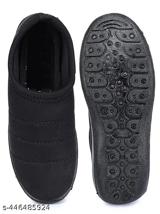 Black canvas women's slip-on shoes, PVC sole, India-origin footwear on display