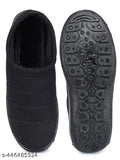 Black canvas women's slip-on shoes, PVC sole, India-origin footwear on display