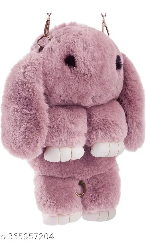 Pink plush rabbit bag with white eyes and yellow ears
