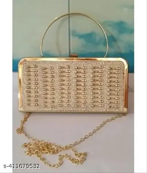 Gold embellished clutch handbag, featuring sequined accents and multiple card slots