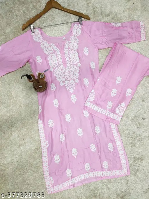 Rayon Modal Chikankari work kurta with rayon palazzos, solid-colored Indian women's Lakhnavi handcrafted ensemble on display
