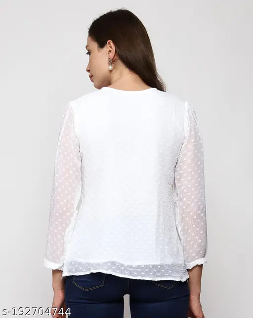 Embellished white Georgette top with 3/4 sleeves, round neckline. Elegant ethnic wear from Prettify Fashion, India