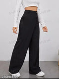 Girl wearing black high-waisted trousers