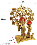 Metal Radha Krishna figurine from Bagla Creations, 22cm tall, set under a large tree in India