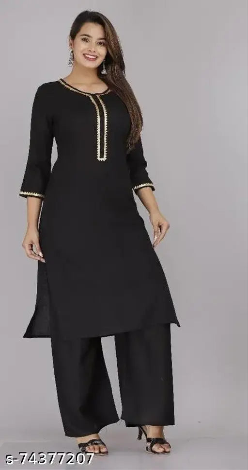 Rayon straight kurta with palazzo set, solid-colored three-quarter sleeves, Indian women's fashion on mannequin