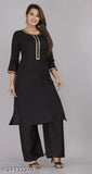 Rayon straight kurta with palazzo set, solid-colored three-quarter sleeves, Indian women's fashion on mannequin