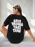 A black cotton round neck women's half-sleeved oversized printed t-shirt with a motivational message