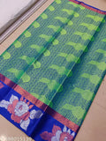 Heavy, soft Banarasi silk saree with vibrant designs and blue border