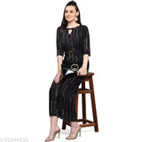 Woman in colorblocked rayon jumpsuit with foil print, short sleeves on mannequin