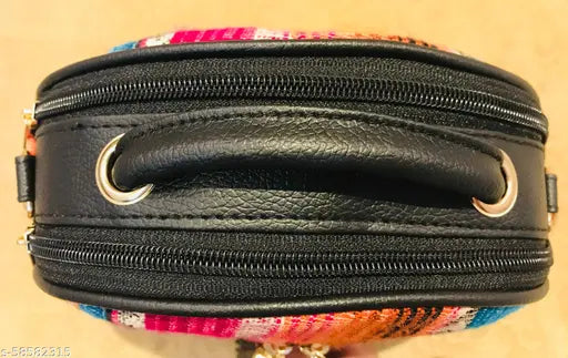 Premium slingbag with canvas and faux leather material, black color, adjustable shoulder strap, multiple pockets and slots, perfect for women and girls
