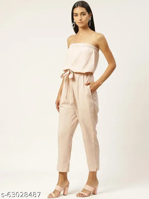 Peach polyester solid western wear jumpsuit with fabric belt for women, casual and festive party wear on model