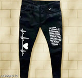 Black printed jeans with heart graphic on leg and 'designer latest' text