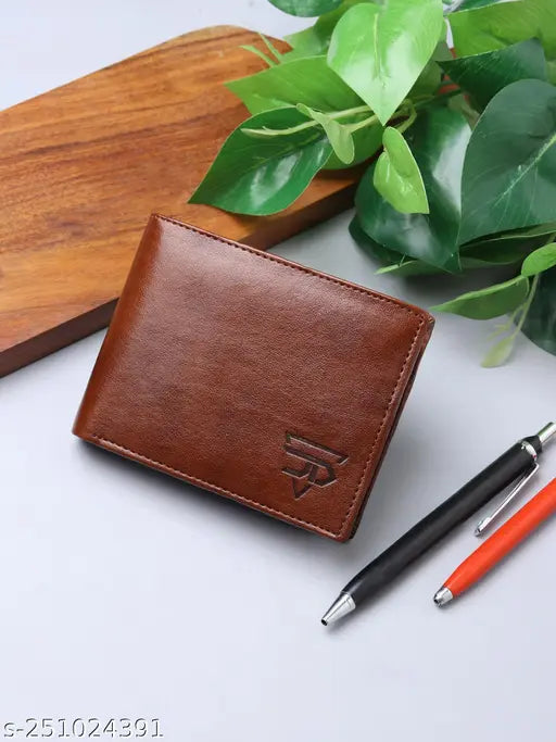 Faux leather wallet for men, 6 card slots, 1 coin pocket, 2 hidden compartments, 2 currency slots, 1 ID slot. Solid pattern, free size (11cm x 9cm). Gift-worthy genuine leather wallet, made in India
