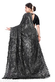 Stylish black georgette saree with metallic silver sequins and long pallu