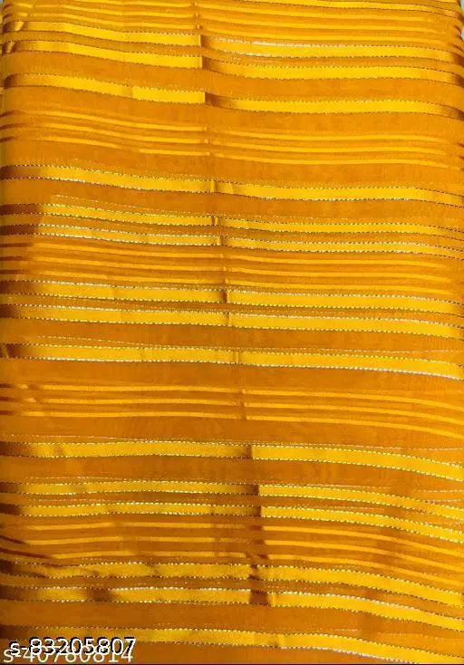 Yellow fabric with fringe, possibly a sari, heavy border design
