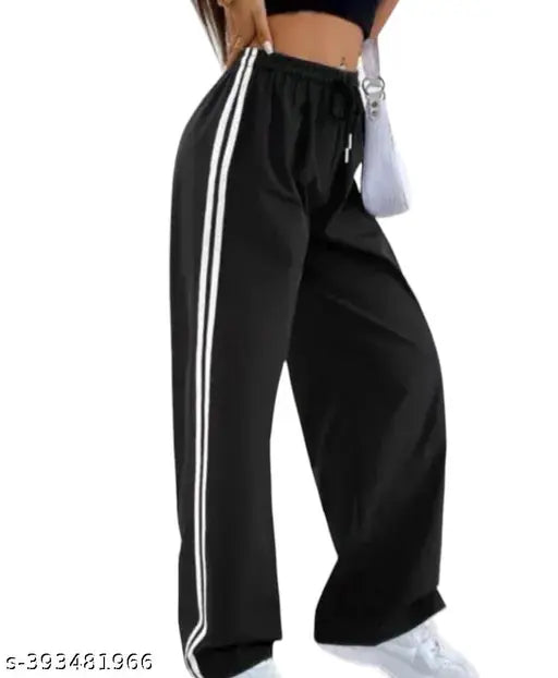 Black and white striped joggers, high waist, casual attire