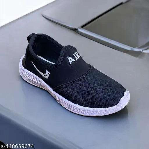 Black running shoes with a white logo on the side, designed for casual and outdoor wear